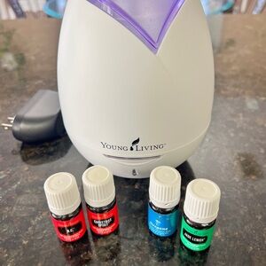 Young Living Diffuser with 4 Essential Oils